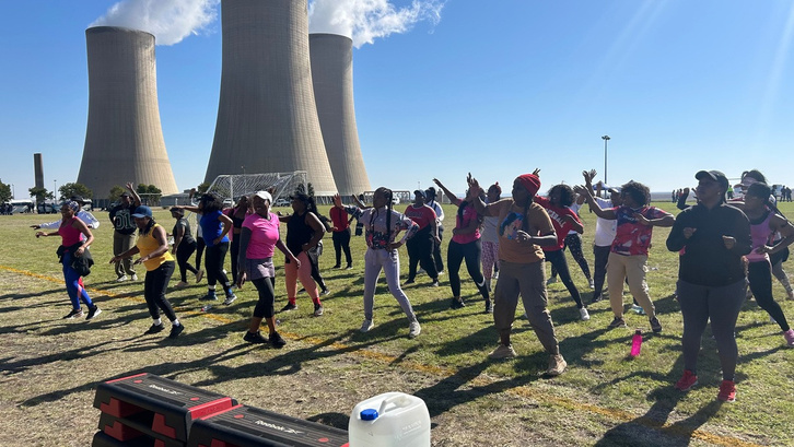 Employees taking part in an outdoor aerobics session