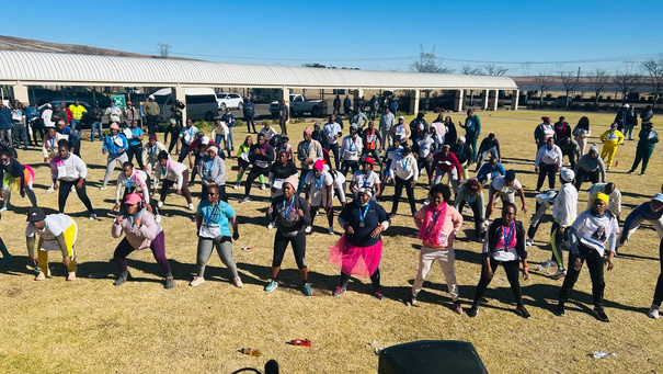 Employees gathered at a PureCardio corporate wellness day